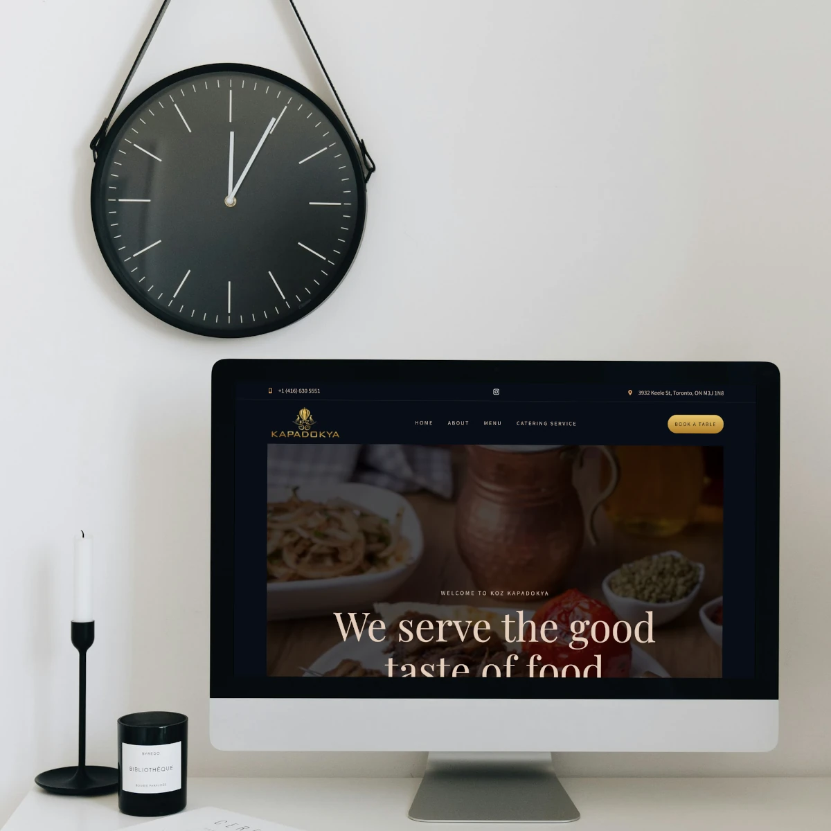 Website of Koz Kapadokya, a Turkish restaurant in Toronto, featuring a dark-themed design and traditional Turkish cuisine with options to book a table and view the menu.